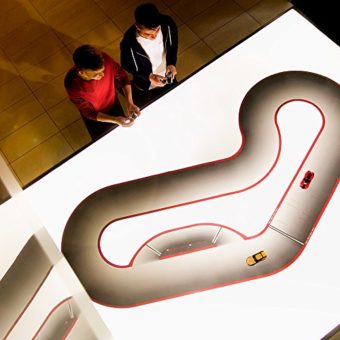 Real-FX-Racing-Slotless-Racetrack-System-including-two-RC-Cars-and-Handsets-with-Artificial-Intelligence-A-Next-Generation-Tech-Toy-Starter-Set-0-0